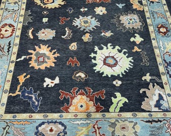 15269 – Handmade Oushak Rug 8x10 ft, Black Wool Area Rug with Colorful Floral Motifs, Traditional Turkish Carpet