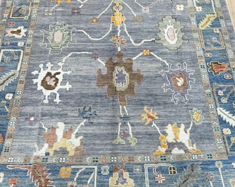 14692 – Handmade Oushak Rug 8x10 ft, Blue Wool Area Rug with Beige Border and Colorful Floral Tribal Motifs, Turkish Carpet