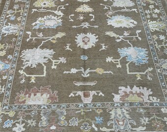 15286 – Handmade Oushak Rug 8x10 ft, Brown Wool Area Rug with Pastel Floral Motifs, Traditional Turkish Carpet
