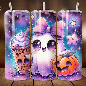 May include: Three Halloween-themed tumblers with a purple and blue galaxy background. One tumbler features a skull-shaped drink, another a cute ghost with a bow and pumpkin, and the third a star. Each tumbler has a straw.
