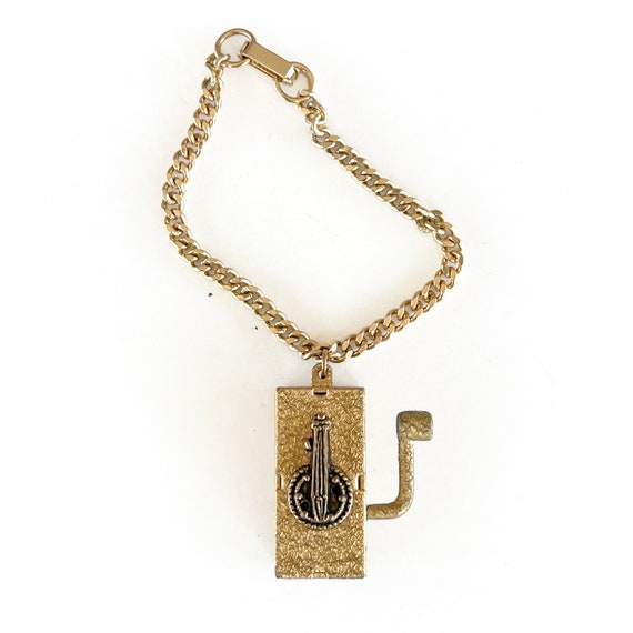 Vintage Wind Up Music Box Charm on Link Bracelet,… - image 1
