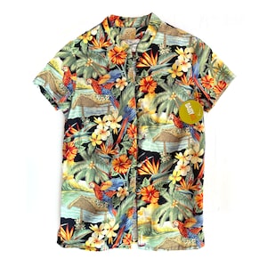 May include: A short-sleeved button-up shirt with a tropical print featuring parrots, palm trees, and flowers. The shirt is black with green, orange, red, and blue accents. The shirt has a tag that says "Daisy Lace".
