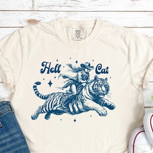 Hell Cat T-Shirt - Fierce Tiger and Rider Graphic Tee - Bold Adventure Shirt, Cowgirl Riding Tiger Shirt, Comfort Colors Tee