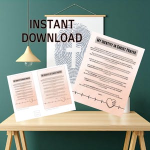 May include: Printable prayer card with a pink and white background. The card features a heart with a cross inside and the text "My Identity in Christ Prayer". The prayer includes verses from the Bible and affirmations about one's identity in Christ.