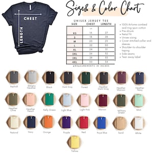 May include: A navy blue unisex jersey tee with a size and color chart. The chart lists chest and length measurements in inches for sizes XS to 4XL. Color options include asphalt, black, forest, and more.