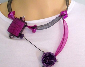 Lily, Purple mesh tubing, black rubber,black mesh tubing,  asymmetrical, contemporary, princess style, back magnetic closure