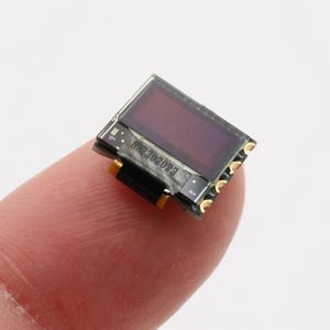 World&#39;s Smallest I2C 0.32&quot; OLED 60x32 Display Screen, Measures 11.5 x 11.5 x 2.4mm, probably the smallest on the market!  Castellated pads