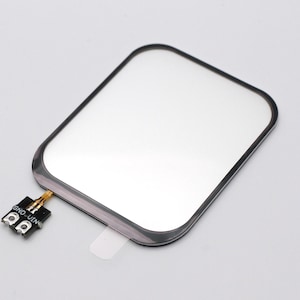 May include: A black square-shaped touch screen digitizer with a gold wire attached to a small black circuit board labelled "GND - VIN".