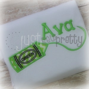 May include: Green crayon with the word "GREEN" on it, with a green swirl coming off the top, and the name "Ava" above it.