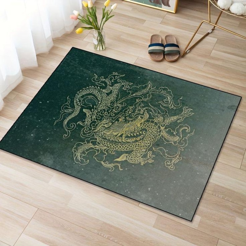 May include: A green and gold area rug with a dragon design. The dragon is outlined in gold and is on a dark green background with a subtle speckled pattern.