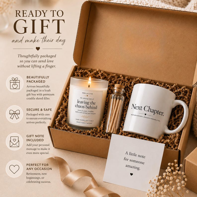 May include: A kraft cardboard gift box containing a white mug with the text Next Chapter, a glass candle jar labeled leaving the chaos behind, a small glass vial filled with wooden matches, and a white card with the text A little note for someone amazing.