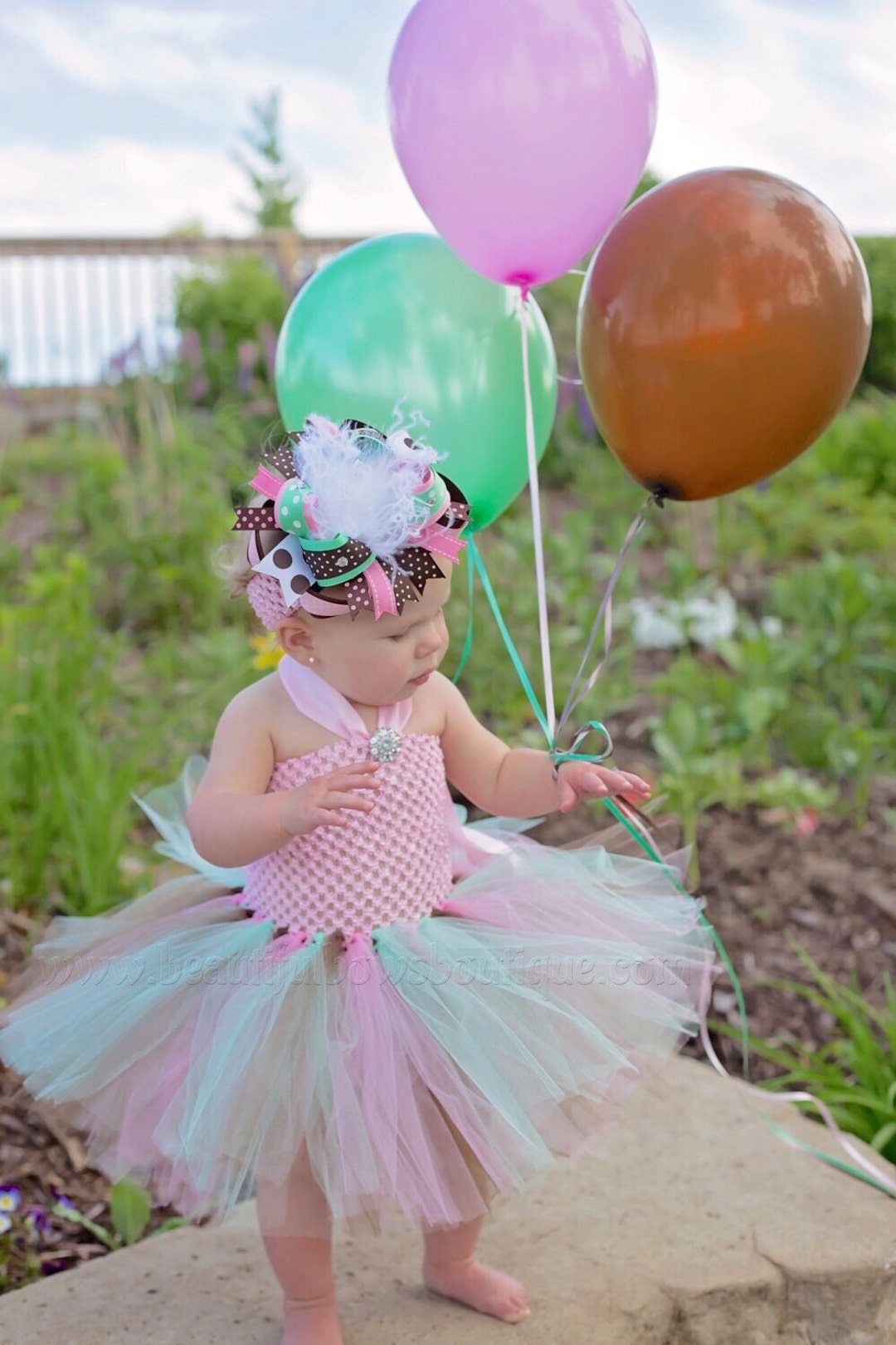 mint green and brown dress