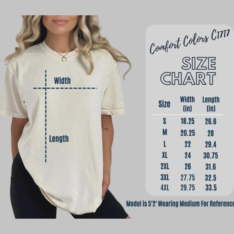 May include: A cream-colored short-sleeve t-shirt with a size chart for Comfort Colors C1717. The chart lists widths and lengths in inches for sizes S through 4XL, noting a model height of 5'2" wearing a size medium for reference purposes.