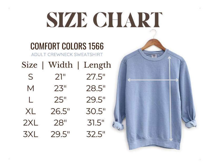 May include: A light blue adult crewneck sweatshirt displayed on a wooden hanger. The image includes a size chart with measurements in inches for sizes S through 3XL. The text on the chart reads "COMFORT COLORS 1566" and "ADULT CREWNECK SWEATSHIRT".