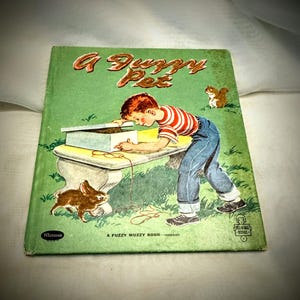 Antique children’s book “A Fuzzy Pet” by Alice Hanson - over 60 years old