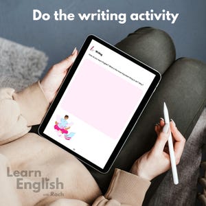 May include: A tablet screen displaying a writing activity for learning English. The text on the screen reads "How do you learn English? What is the most important thing to do? Why?"  The screen also features an illustration of a person sitting in a lotus position with a laptop and papers.