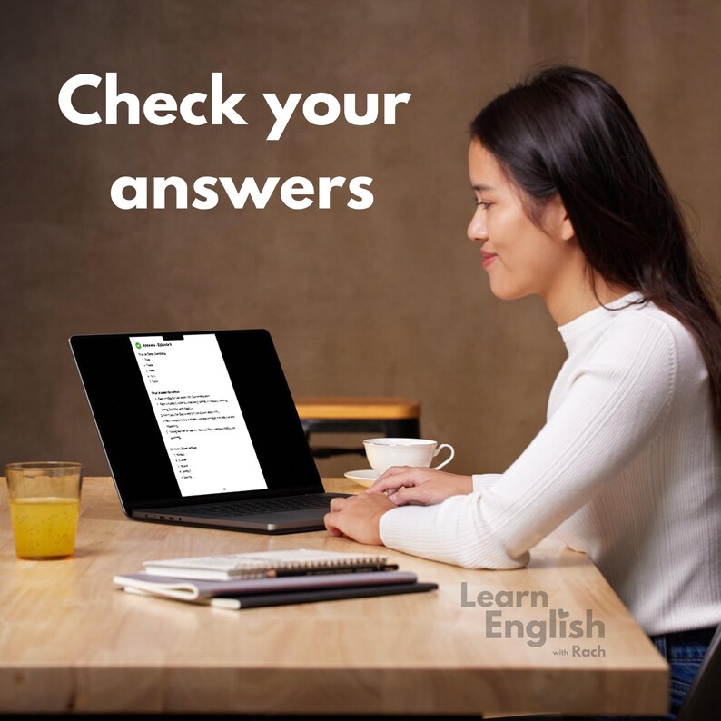 May include: A woman sits at a table with a laptop open, reviewing answers on a screen. The screen shows a list of questions and answers. The text on the screen reads "Grammar Practice". The text "Check your answers" is displayed above the laptop. The text "Learn English with Rach" is displayed in the lower right corner of the image.