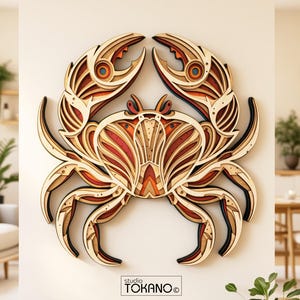 May include: A multi-layered wooden wall art piece shaped like a crab, featuring intricate cutouts and a color palette of natural wood, orange, and deep red. The design includes symmetrical claws and legs, with the text studio TOKANO printed below.