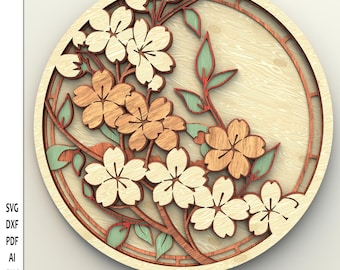 May include: A round wooden wall art piece with a 3D layered design of cherry blossoms in shades of brown, white, and green. The art piece is titled "WOOD Collection" by studioTOHANO.com.