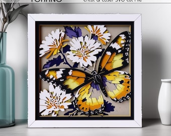 Op de afbeelding: Een meerlaags papieren kunstwerk in een witte lijst met een grote oranje, gele en zwarte vlinder omringd door witte en gele bloemen. De tekst bovenaan luidt studio TOKANO Cricut & Laser SVG Cut File, en onderaan 8 LAYER DIGITAL DOWNLOAD SVG | PDF | PNG | AI | DXF.