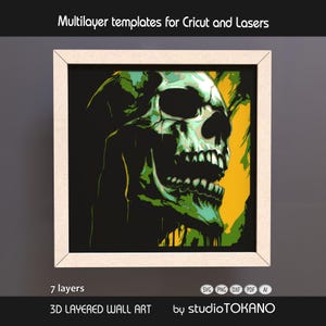 May include: A square 3D layered wall art piece featuring a stylized skull graphic in shades of green, black, and yellow. The design is framed in a light-colored border. Text includes Multilayer templates for Cricut and Lasers, 7 layers, and studioTOKANO.