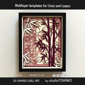 May include: A 3D layered wall art template featuring bamboo stalks and a geometric circle pattern in shades of cream, pink, and dark maroon. The design includes 5 layers for 8.5" x 11" paper, with text reading Multilayer templates for Cricut and Lasers.
