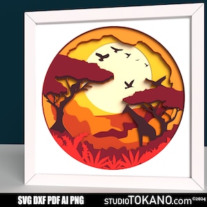 May include: A paper cut-out design of a sunset scene with a giraffe, trees, and birds. The design is in shades of orange, red, and yellow.