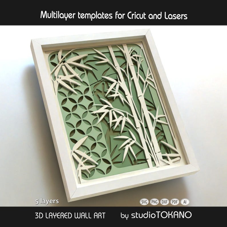 May include: A 3D layered wall art piece in a white frame featuring a bamboo design with five distinct layers. The artwork displays intricate cutouts of bamboo stalks and leaves against a geometric circular pattern in shades of light green.