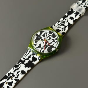Original SWATCH Vintage FLAECK (GZ117) by Niklaus Troxler from 1991. Functional and in good condition.