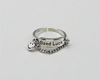 Anillo ajustable de plata S925 con diseño de cara sonriente y apilable.
