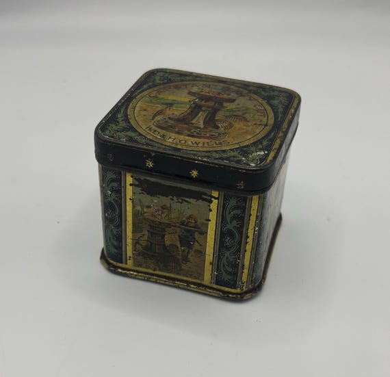 wd & ho wills tobacco tins Vintage W.D. & H.O. Wills Tobacco Tin: Britannia Mixture, Match Striker  Base, 1920s