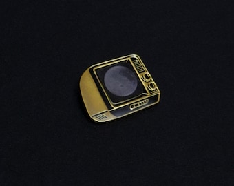 Oro con "Luna giratoria"