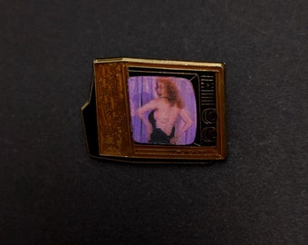 Woodgrain TV with "Tempest Storm"
