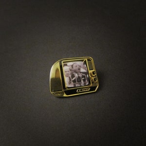 Black & Gold Edition Glow In The Dark TV Pin with Pre-Installed "Martin Luther King Jr."