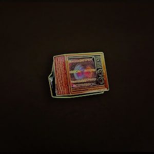 Woodgrain Television Glow In The Dark Enamel Pin with "Intermission"