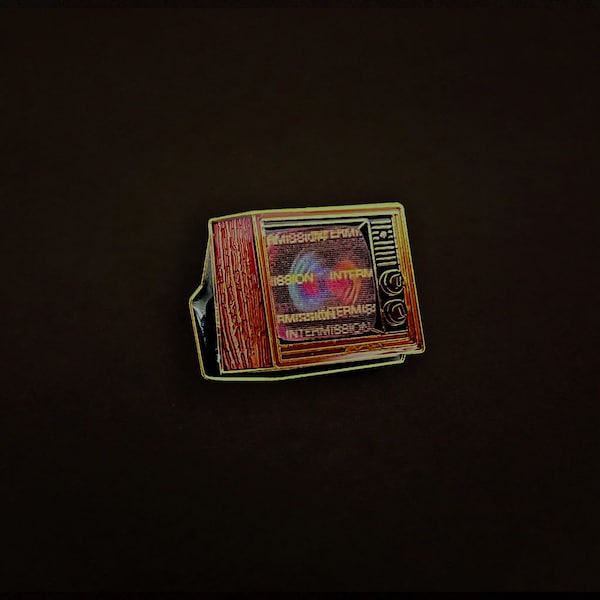 Woodgrain Television Glow In The Dark Enamel Pin with "Intermission"