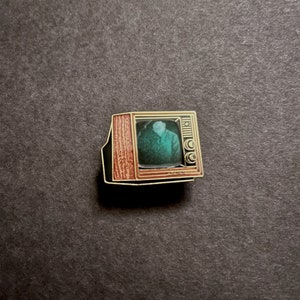Woodgrain Television Glow In The Dark Enamel Pin with Pre-Installed &quot;Nosferatu Turn&quot;