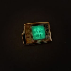 Woodgrain Television Glow In The Dark Enamel Pin with Pre-Installed &quot;Metropolis - Full Transformation&quot;
