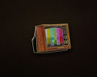 Woodgrain Television Glow In The Dark Enamel Pin with Pre-Installed &quot;Metropolis - Full Transformation&quot;