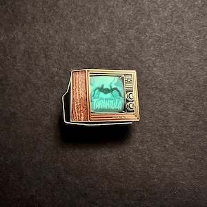 Woodgrain Television Glow In The Dark Enamel Pin with Pre-Installed "Tarantula"