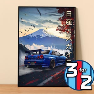 May include: A blue Nissan Skyline R34 sports car driving on a winding road with a mountain in the background. The Japanese text on the side of the image reads "日産 スカイライン".