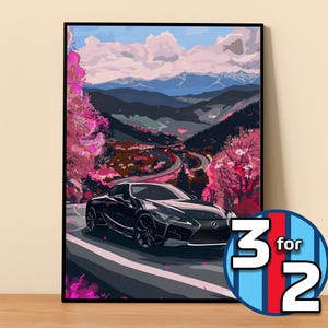Puede incluir: Un coche negro circula por una carretera sinuosa a través de un paso de montaña. La carretera está bordeada de cerezos en flor de color rosa. El coche es un Lexus LC 500.