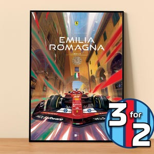 May include: Framed poster featuring a red Formula 1 race car speeding through a European city. The poster includes the text "EMILIA ROMAGNA IMOLA" and a "3 for 2" promotional sticker.