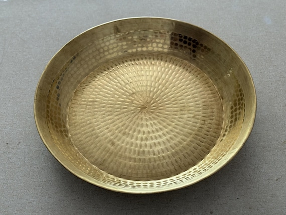 A handcrafted pure brass Indian parat/pooja thali — a stunning traditional piece with 38 favorites that doubles as kitchen art and a meaningful cultural gift.