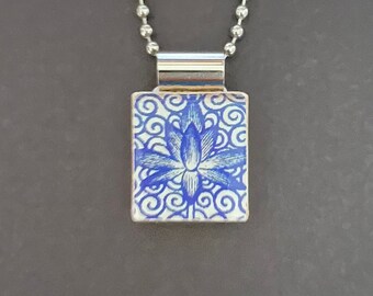 Blue Lotus pendant on recycled scrabble tile with long chain