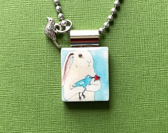 bunny with bird necklace, valentine's day jewelry, handmade valentine jewelry, nakisha vanderhoven necklace, handmade jewelry, easter gift