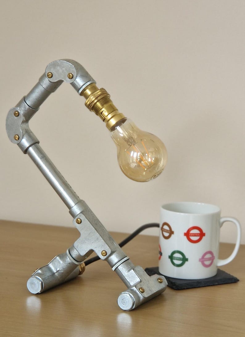 Handmade industrial lamp, perfect for modern home decor, featuring galvanized steel, brass