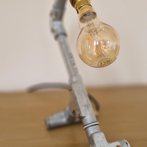 Handmade industrial lamp, perfect for modern home decor, featuring galvanized steel, brass. Steampunk decor style