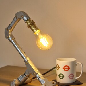 Handmade industrial lamp, perfect for modern home decor, featuring galvanized steel, brass. Steampunk decor style