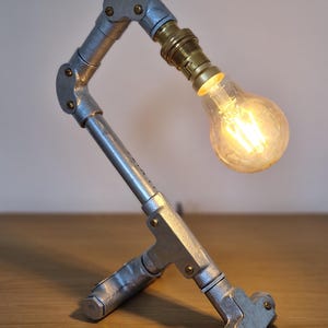 Handmade industrial lamp, perfect for modern home decor, featuring galvanized steel, brass. Steampunk decor style